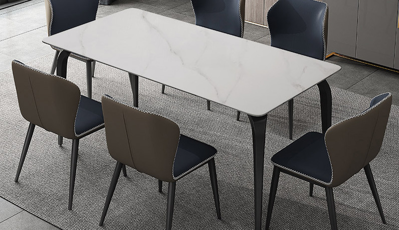 歌迪 现代简约 大象腿餐桌 哑光雪山石岩板面 色泽天然通透纹理淡雅细腻 优质黑色碳素钢底架 拱形结构均匀受力强劲支撑 稳固承重不摇晃 科学离地高度宽敞舒适 1.4米餐桌